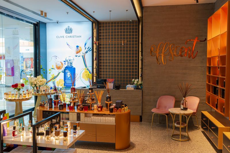 Offscent at Family Mall, Erbil: fragrance tables and a Clive Christian window display